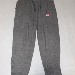 Nike Kids Charcoal Joggers with Pink Logo